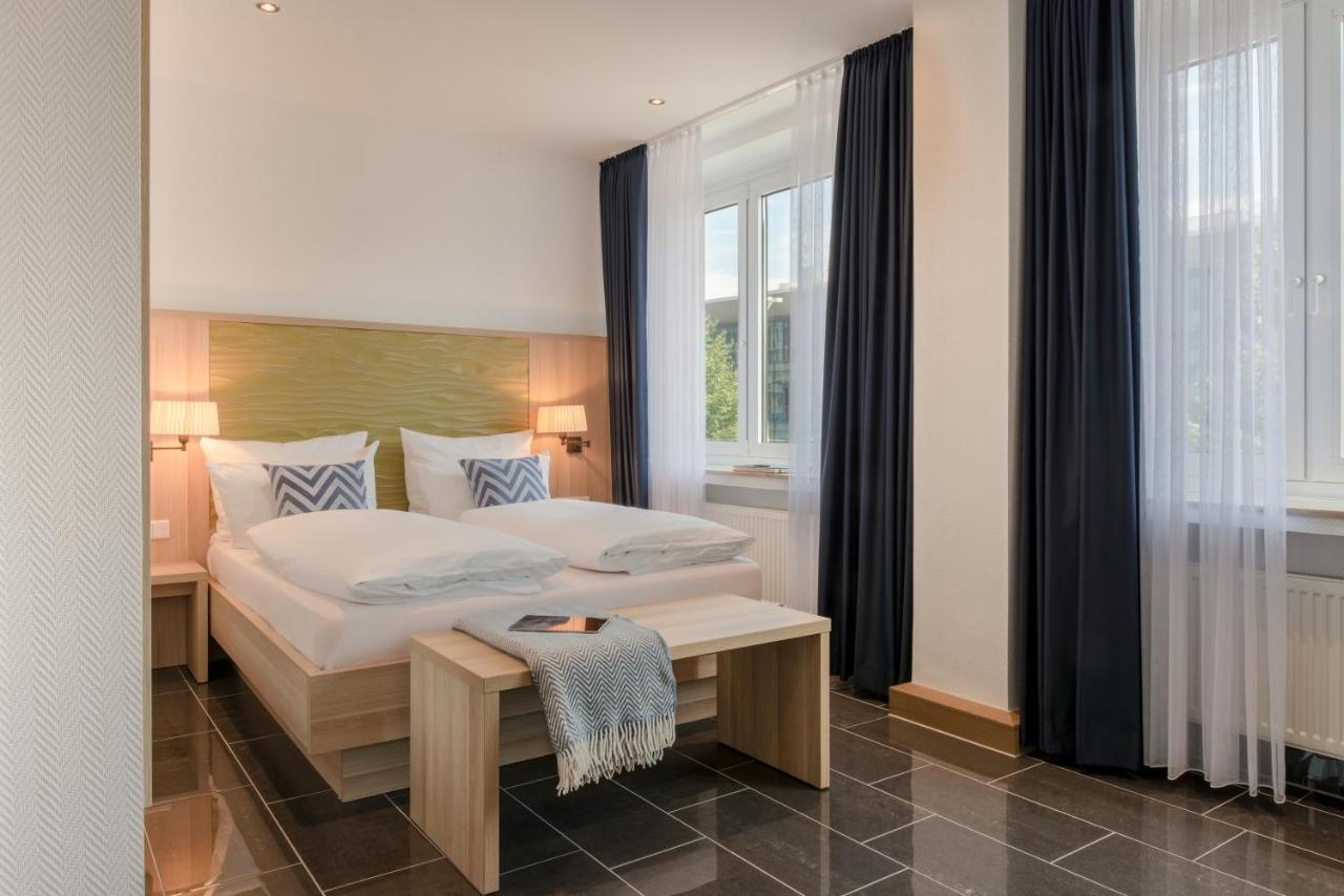 Hotel Conti Am Hauptbahnhof Munster  Bagian luar foto
